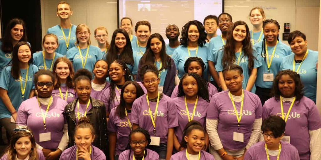 Facilitators, undergraduate mentors and middle school students pose during Duke’s “Day of Data” in Spring 2019.