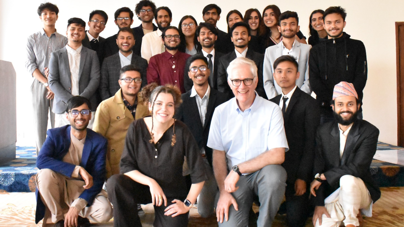 Lau (front left in black) and Gavin (front right in white) in March 2023 at the Kathmandu Geohazard Early Warning Research Symposium, held in Nepal. Lau organized the symposium to celebrate the team’s international partnership and research.