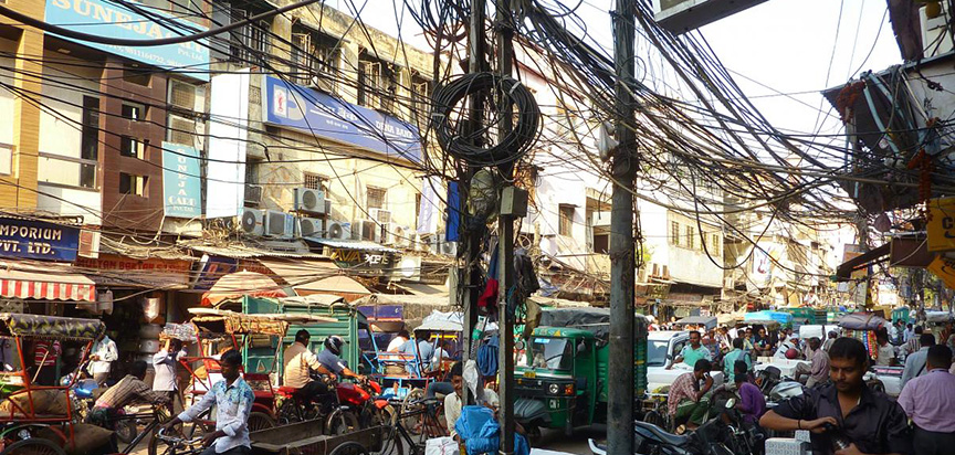 Wires on a street in Delhi, by T. Rob Fetter