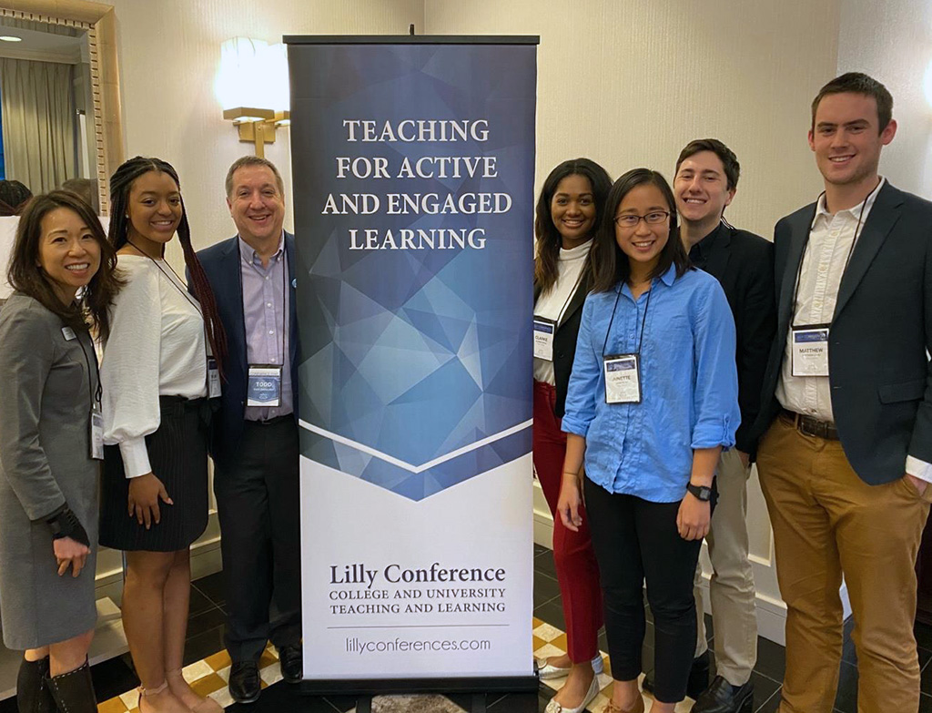 Dr. Minna Ng and student members of the Bass team pose with the keynote speaker for the Teaching for Active and Engaged Learning 2020 Lilly Conference.