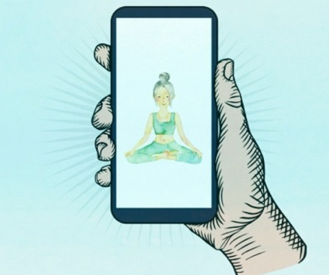 Hand holding phone with image of person meditating