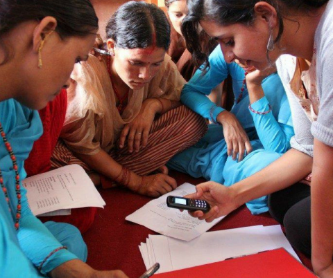 Women using a mobile phone for healthcare purposes