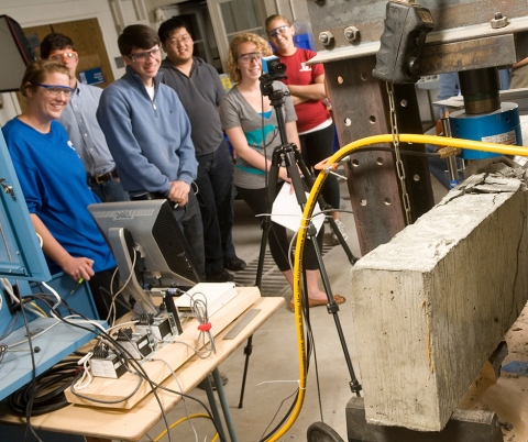 Engineering students test concrete beams during a lab class at Hudson Hall on March 26, 2009.