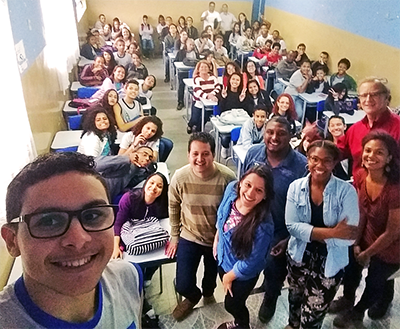 Cost of Opportunity team members at a screening of their documentary in Brazil