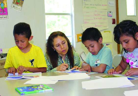 Teacher with students