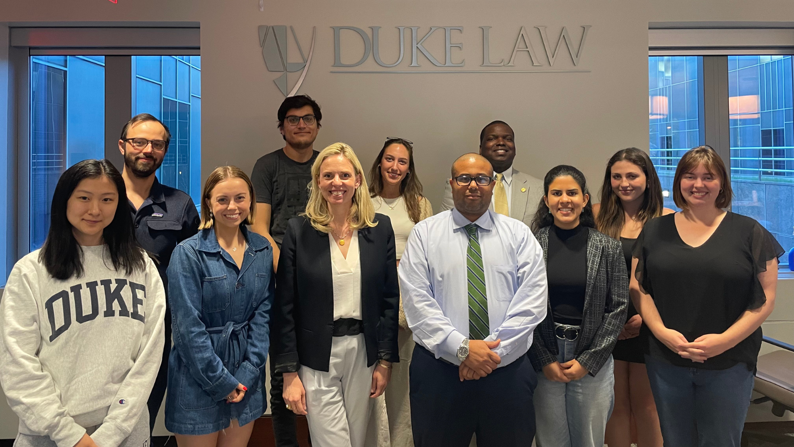 Brockelman (top row, middle) and members of the Trauma-Informed Courts team with North Carolina District Court Judges Mike Silver (bottom row, green tie) and Quentin McGee (top row, yellow tie) (Photo: Courtesy of Amelia Thorn).