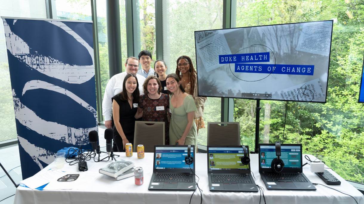 Agents of Change team members at the Bass Connections Showcase. Photo by Les Todd.