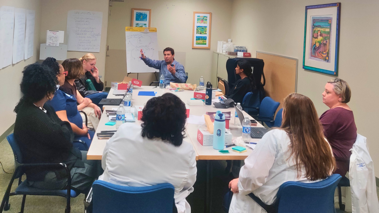 Team members at an interactive modelling session with the case managers from GenMed Department at Duke Health in April 2024.