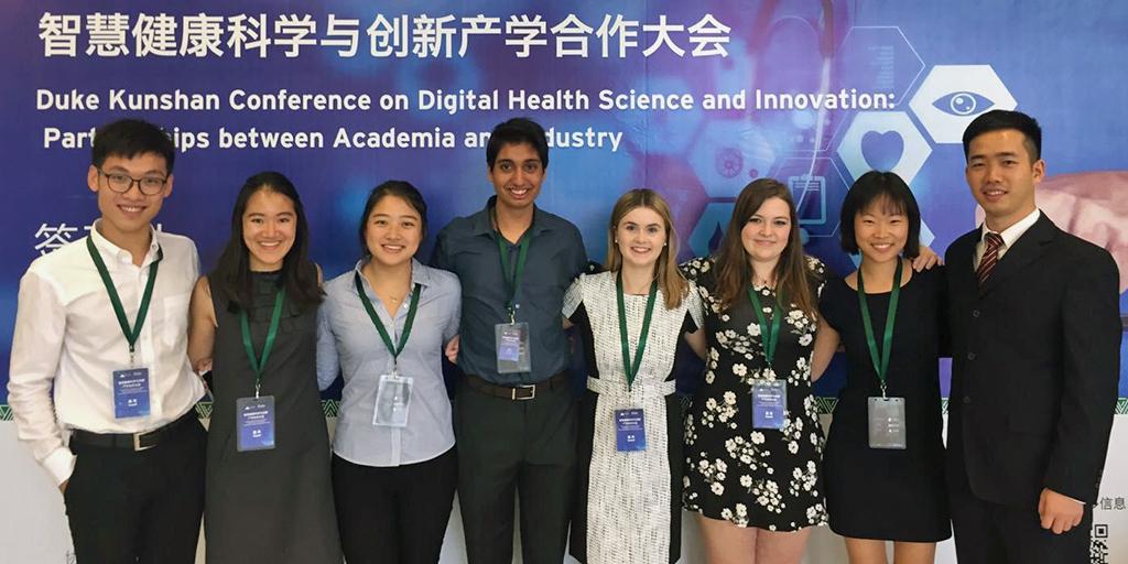 Yu and team members participate in a digital health conference